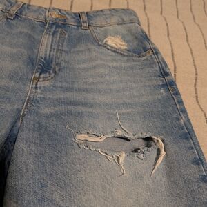 Distressed Light Blue Denim Jeans